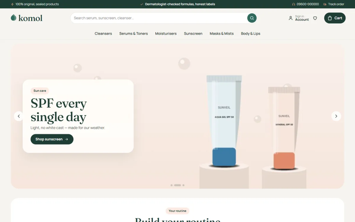 Komol skincare website template homepage on a desktop with a sunscreen slider